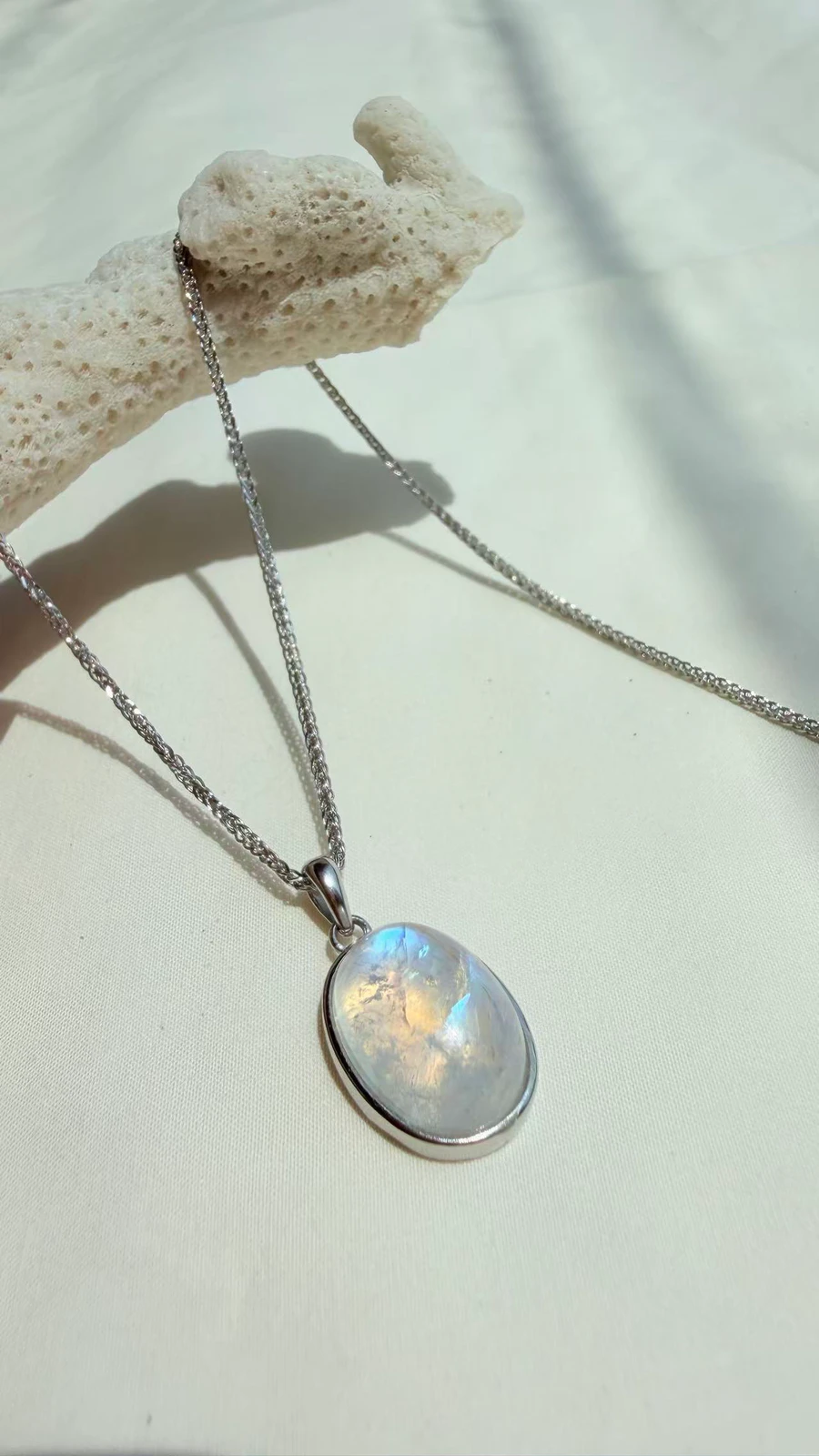 White Moonstone Oval Pendant in natural light